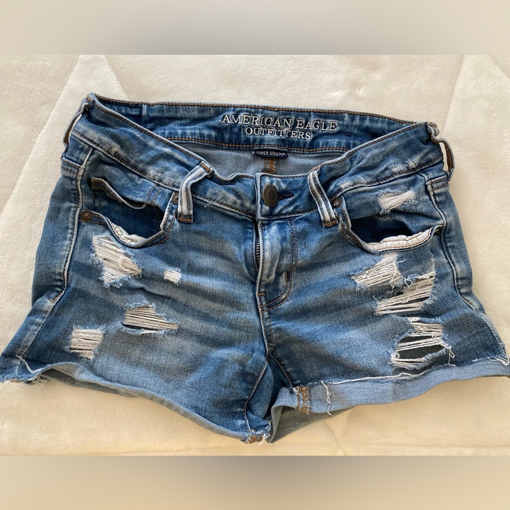 American Eagle superstretch super Low shortie , aero denim Jean Shorts size 4